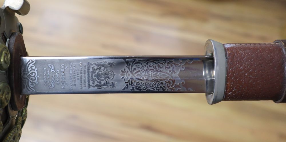 A 1912 Pattern Cavalry sword ER II, shagreen grip and 94cm etched, single edged blade, leather scabbard